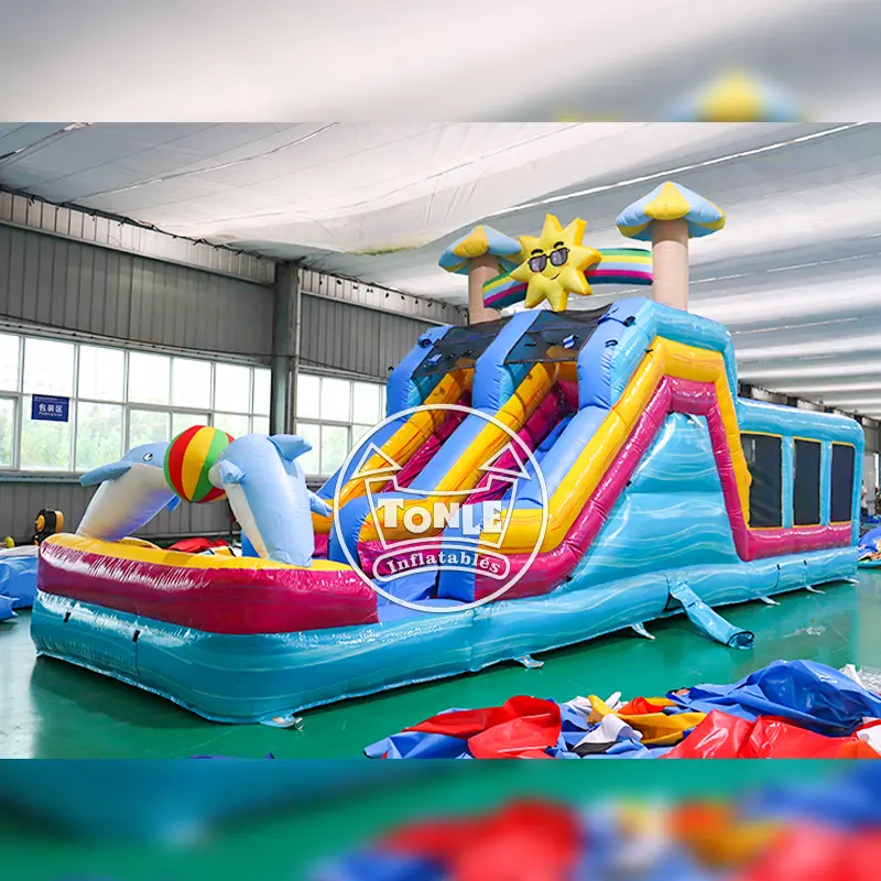 Sunshine Dolphin Inflatable Obstacle Course 11x3m with blue slides and dolphin figures