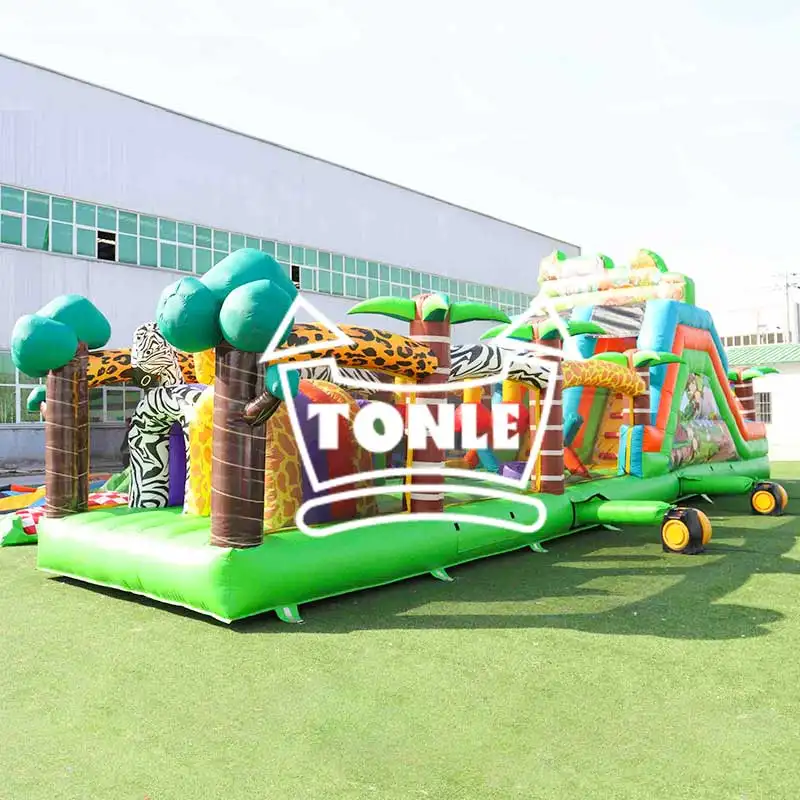 Happy Zoo Theme Obstacle Course featuring green base, animal print columns, and slide on artificial turf