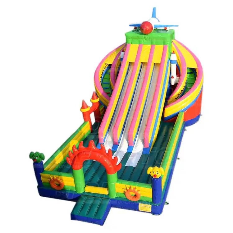 Front view of colorful spaceship inflatable slide with airplane topper and dual lanes