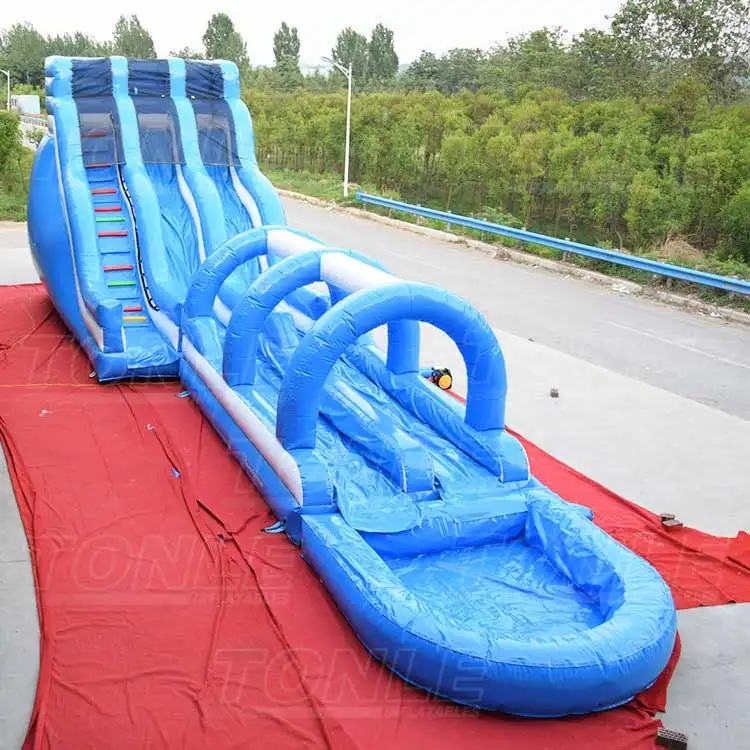 22ft Tsunami Rainbow Helix Dual Lanes water slide showing blue structure with helix arches and splash pool