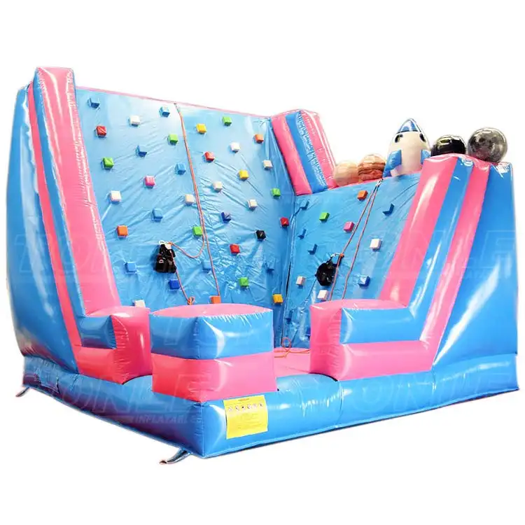 Pink and blue inflatable rock climbing wall with dual lanes and colorful handholds