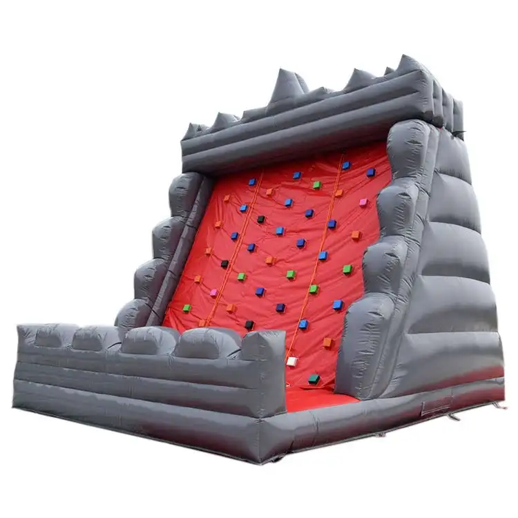 Grey and red inflatable climbing wall with castle turret design and three climbing lanes
