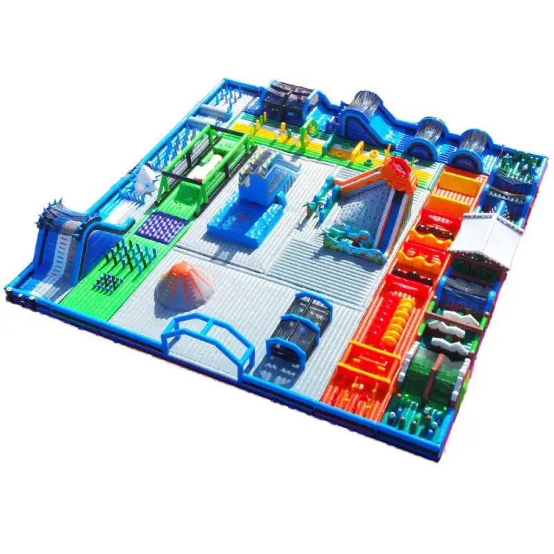Grand World Theme Game Park aerial view showing blue perimeter and multi-color obstacle zones