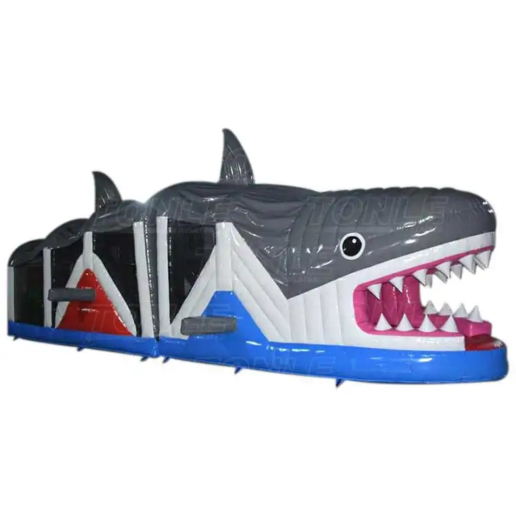 Side view of 15m grey shark inflatable obstacle course with open mouth entrance
