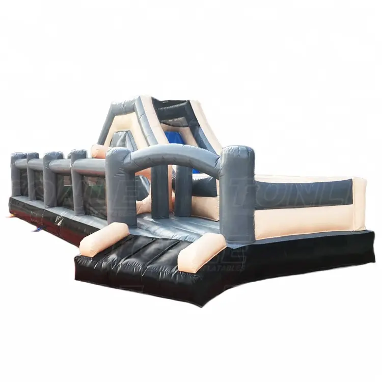 Side view of 9m grey and beige inflatable obstacle course with climbing peak