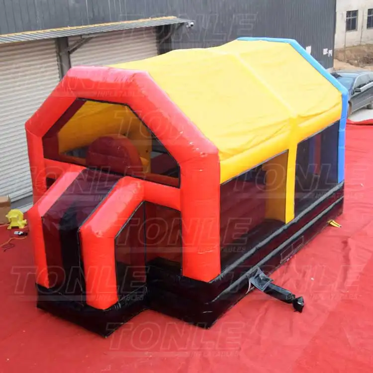 Red, yellow, and blue inflatable sport arena measuring 8x4m with mesh windows