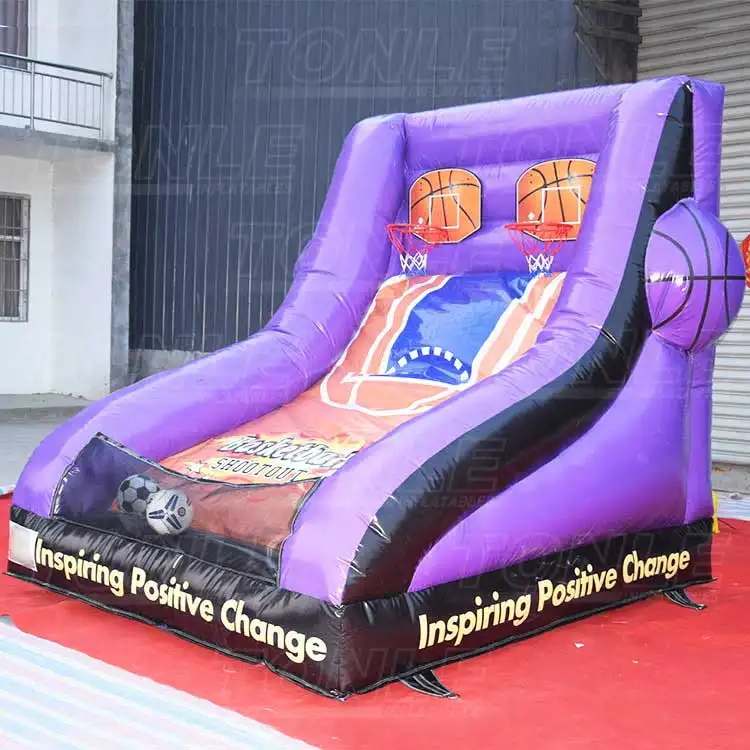 Purple and black inflatable basketball shootout game with dual hoops and printed court design