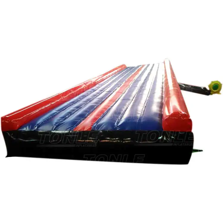 Red and blue striped 33ft inflatable air track with black base