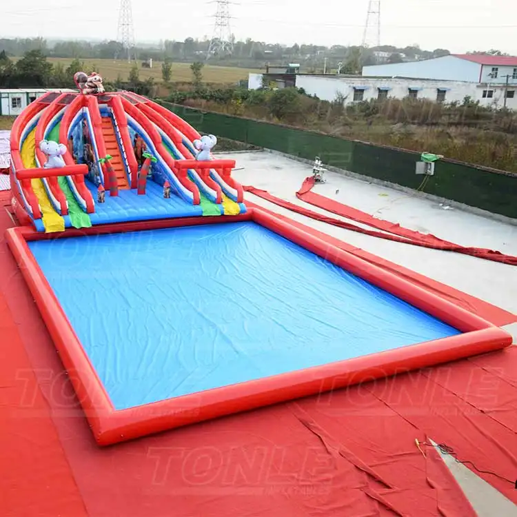 Elephant Land Square Water Park featuring red multi-lane slides and blue splash pool