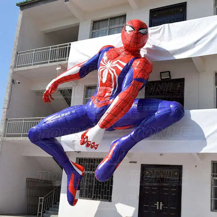 Giant Inflatable Spiderman 6.3m tall climbing pose on building facade