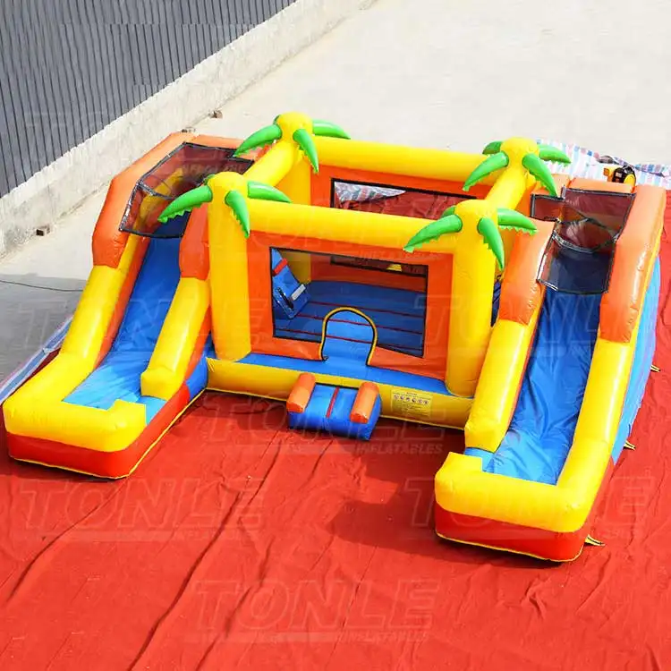 rainforest rapids bounce house with slide — photo 1