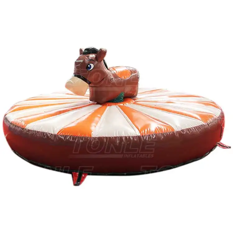 Inflatable swing bull game with brown donkey figure on orange and white striped base, 4.5m size