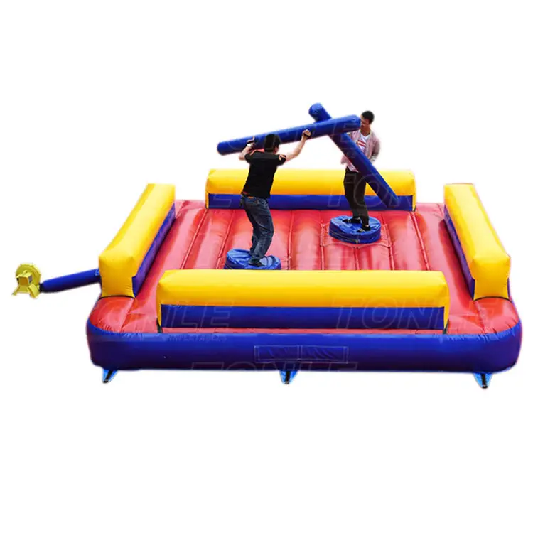 Red blue and yellow inflatable gladiator game with two players dueling on pedestals