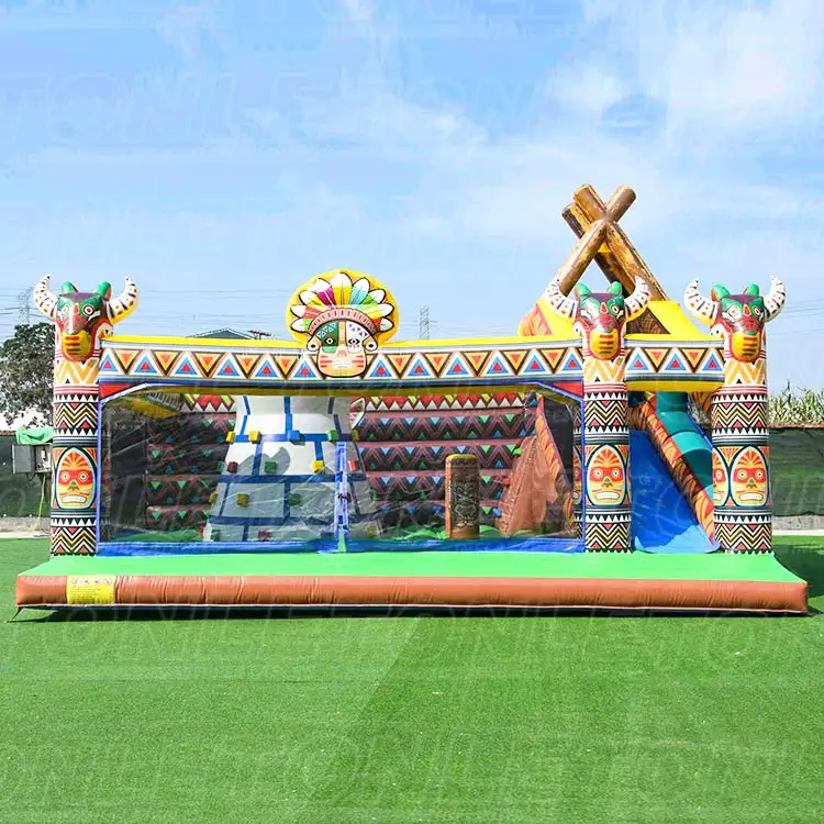 Gypsy Theme Playground inflatable with totem pillars and slide on grass