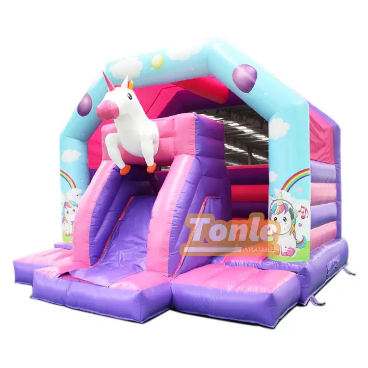 Unicorn themed bouncy castle inflatable bounce house — photo 1