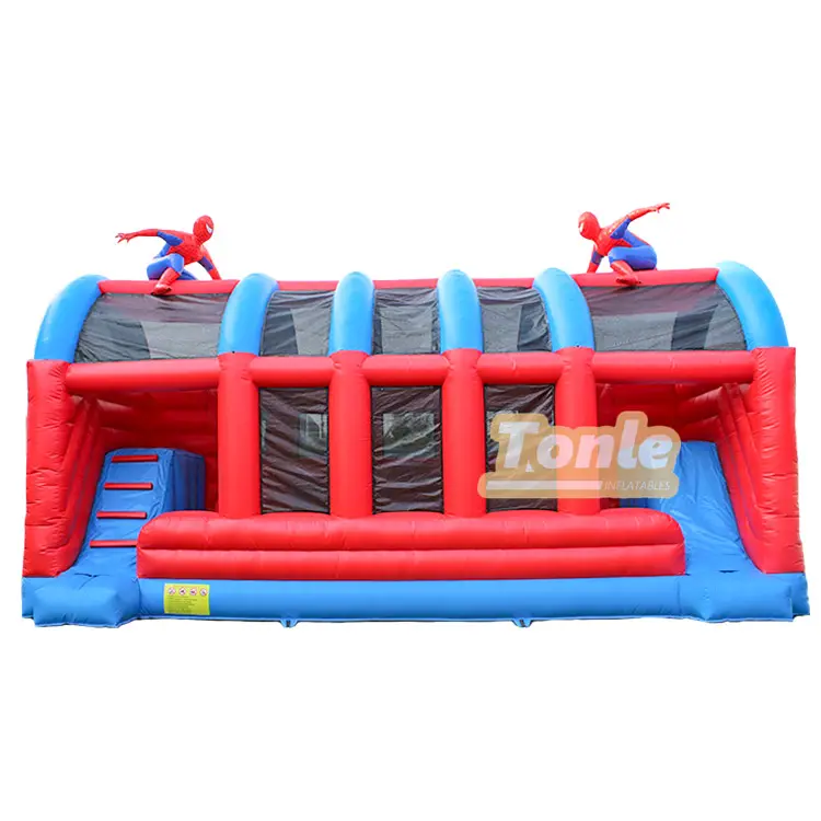Red and blue inflatable obstacle course with Spider-Man figures on top, 9x4m size