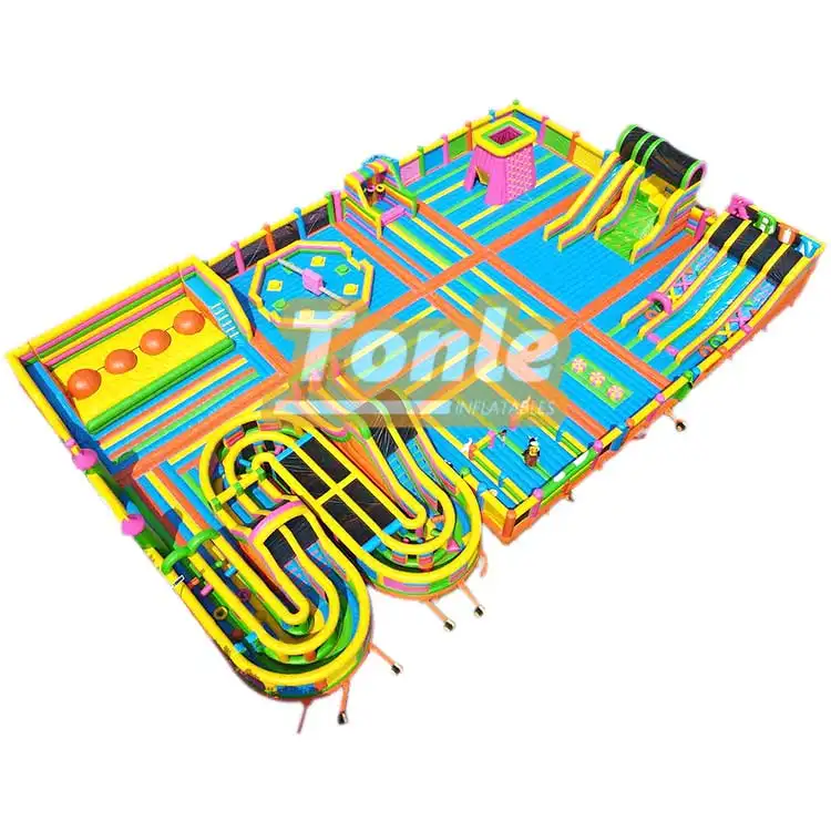 Aerial view of 40x25m colorful inflatable fun city with slides and maze