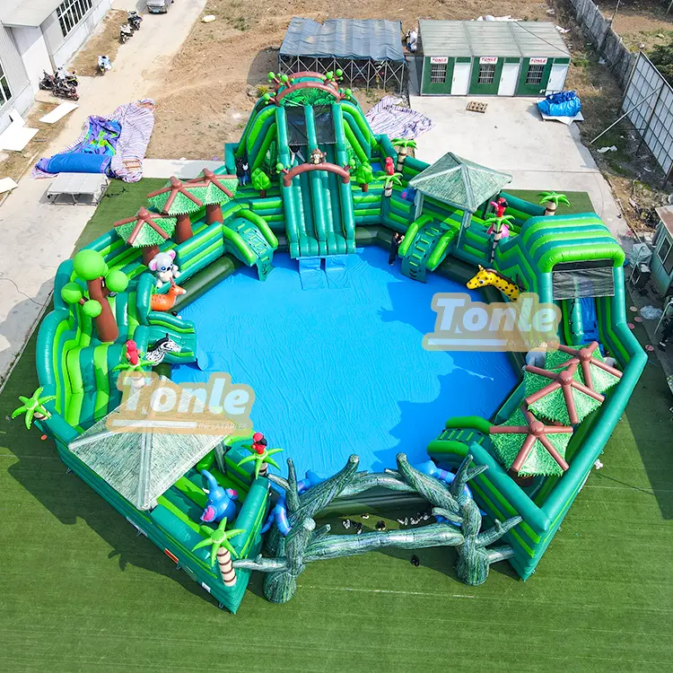Aerial view of 22x20m green inflatable jungle water park with central blue pool and animal decorations
