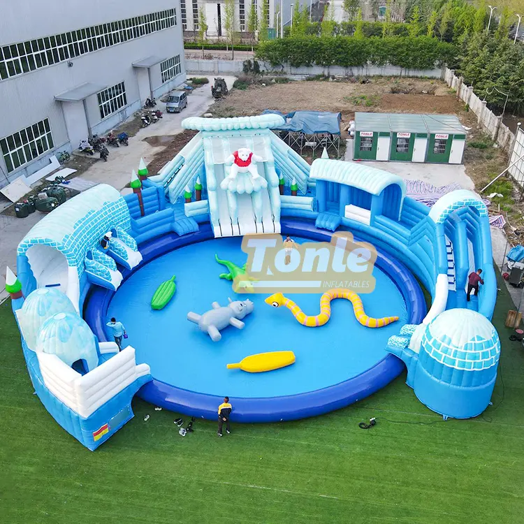 Aerial view of 21m blue and white inflatable water park with polar bear slide and central pool