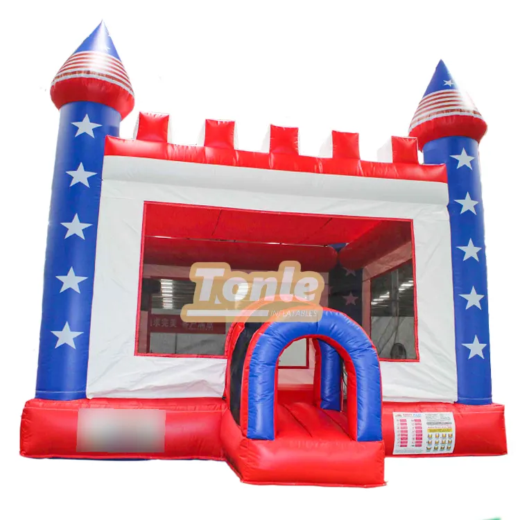 Front view of red white and blue American flag theme bounce house with star turrets