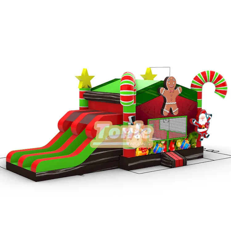 Red and green Christmas gingerbread inflatable bounce house with dual slide lanes and candy cane pillars