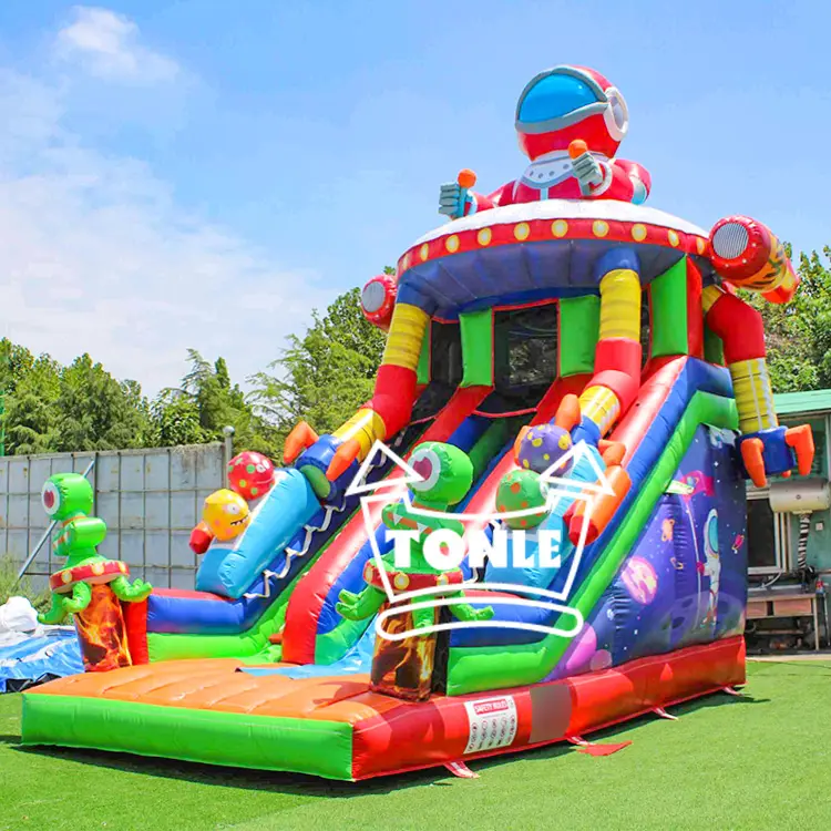 Space theme inflatable dry slide with astronaut topper and dual lanes measuring 7x4.6x6.5m