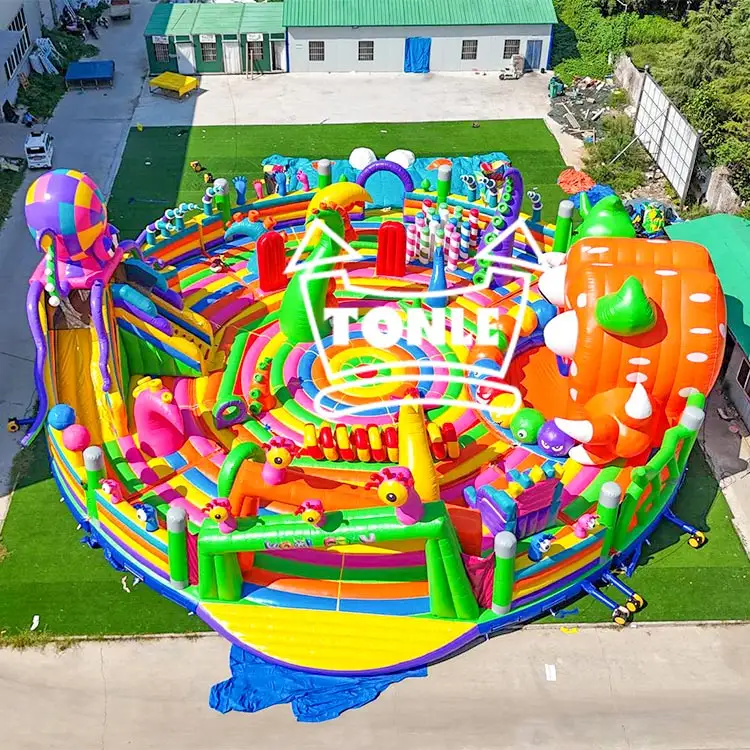 Aerial view of 25m Disc Monster Theme Game Park with colorful obstacles and orange monster wall