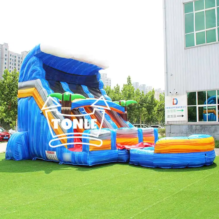 17ft blue white and red double lane water slide with tropical wave theme on grass