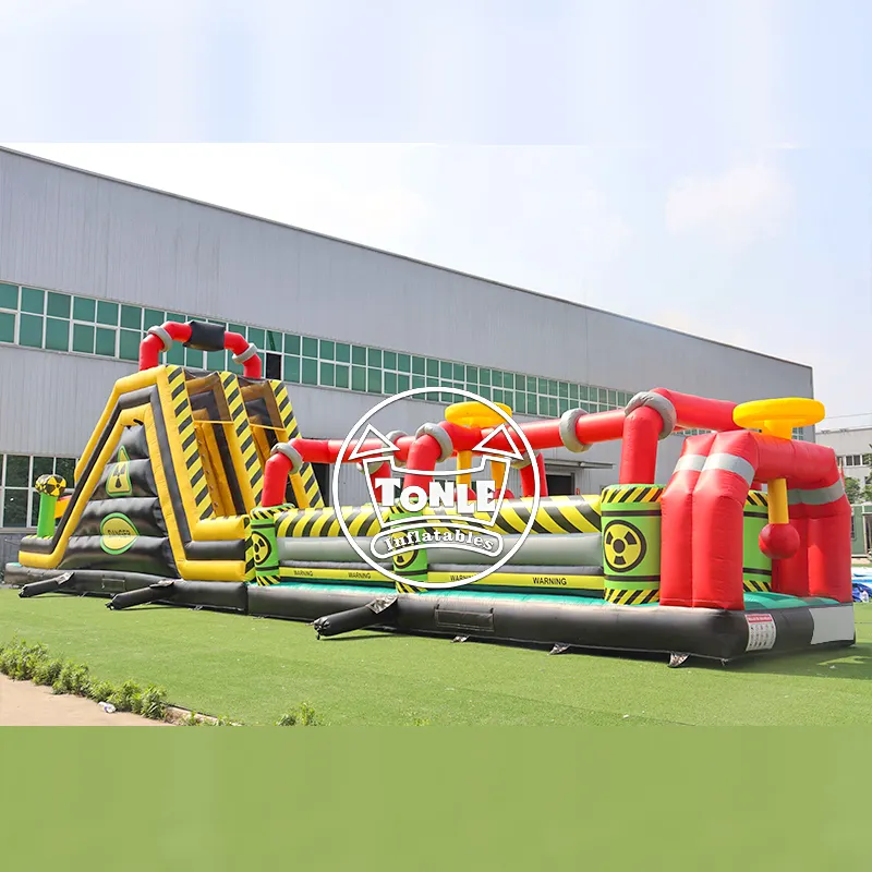 67-ft Chemical Danger Zone Linear Obstacle with yellow climbing wall and red pipe tunnels on grass